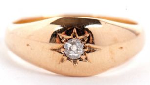 A late Victorian 15ct single stone diamond ring, the old mine cut diamond, gypsy set to a plain