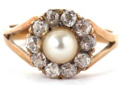 An 18ct cultured pearl and diamond ring, the round cultured pearl surrounded by old mine cut