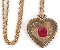 A heart shape ruby set pendant, the heart set with a cushion shape ruby, approx. 7.5 x 6.3mm,