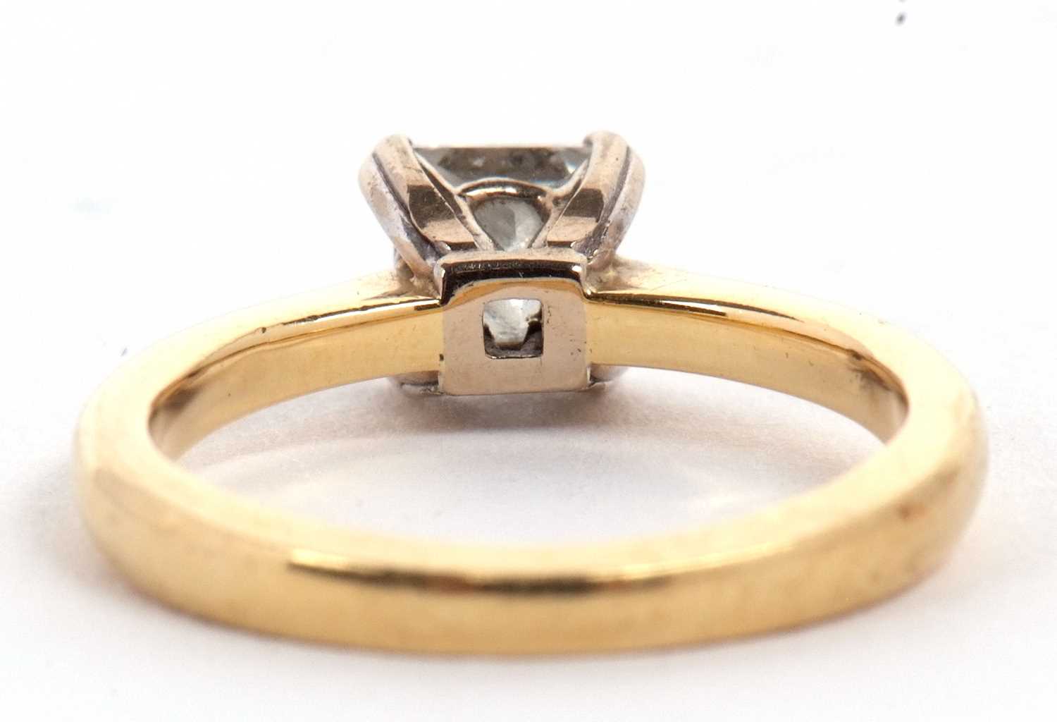 An 18ct princess cut diamond ring, wieght approx. 0.75cts, in a four claw mount to a plain band - Image 5 of 11