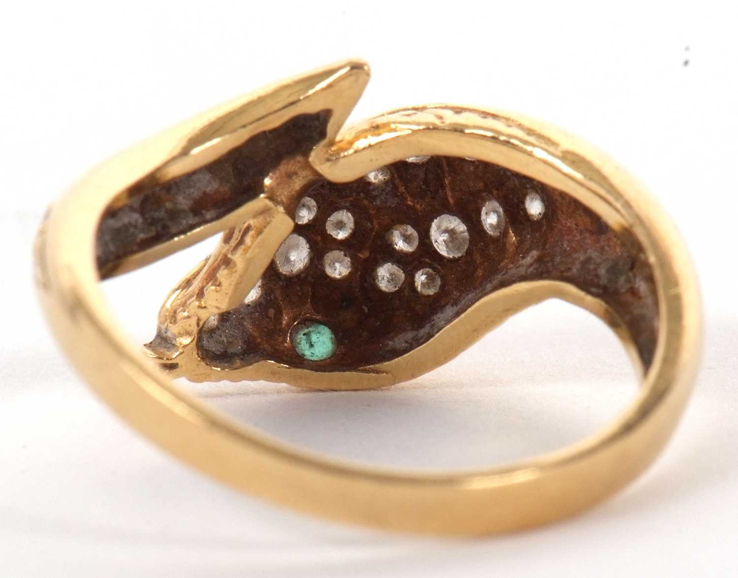 An 18ct snake head ring, the naturalistically modelled head pave set with diamonds and green - Image 5 of 8