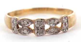 A 9ct diamond ring, the 4mm wide band set with small round diamonds, with tapered shoulders and