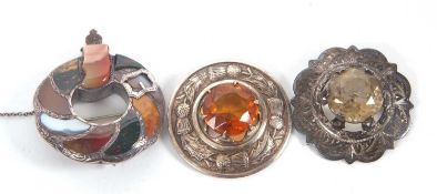 Three Scottish brooches, to include a silver and citrine brooch, Glasgow 1954, 4.5cm diameter, a