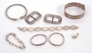 A quantity of silver and white metal jewellery to include a 2cm wide buckle bangle stamped 'sterling