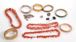 A quantity of mixed jewellery to include two coral branch necklaces, agate bead necklace, micro