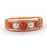 A Victorian 15ct coral and split pearl ring, set with alternating coral cabochons and split pearls