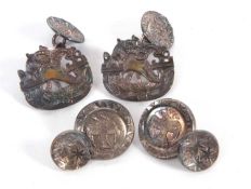 Two pairs of silver cufflinks by Malcolm Appleby: the first with pierced oval panels depicting a
