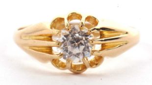 An early 20th century 18ct white sapphire ring, the round white sapphire, claw mounted with reeded