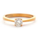 An 18ct diamond solitaire ring, the round brilliant cut diamond estimated approx. 0.37cts, in a four