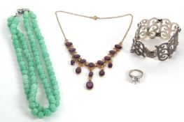 A quantity of costume jewellery to include a two strand green glass bead necklace with paste