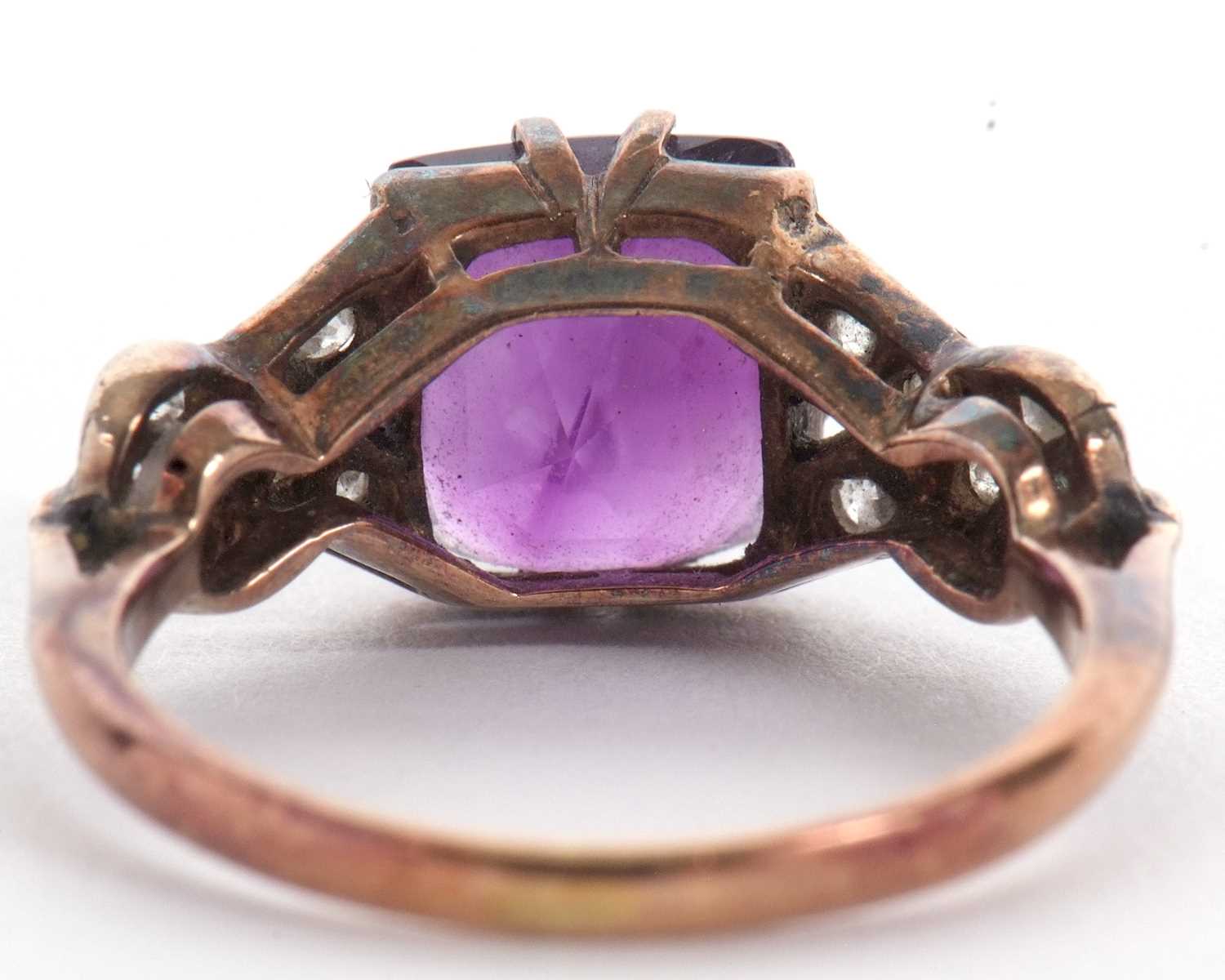 An amethyst and diamond ring, the modified square cut amethyst, claw mounted with crossover - Image 3 of 8