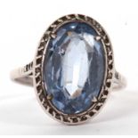 A synthetic blue spinel ring, the oval synthetic blue spinel, claw mounted with marcasite style
