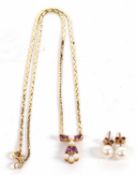 A 9ct cultured pearl and amethyst necklace and 9ct cultured pearl earrings, the necklace set with