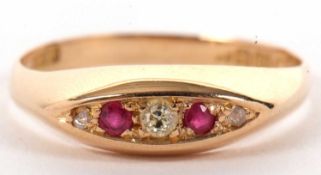 An 18ct ruby and diamond ring, the marquise shape plaque set with alternating rubies and diamonds,