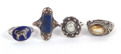 Four rings: to include a white metal and cultured baroque pearl ring, with scalloped border with
