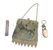 A mixed lot to include a lady's painted white metal mesh purse, a white metal filigree scent