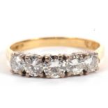 An 18ct five stone diamond ring, the five round brilliant cut diamonds, total estimated approx. 1.