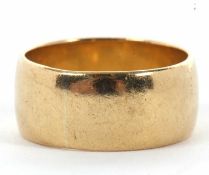An unmarked yellow metal ring, tests as approx. 18ct gold, size O, 9.4g