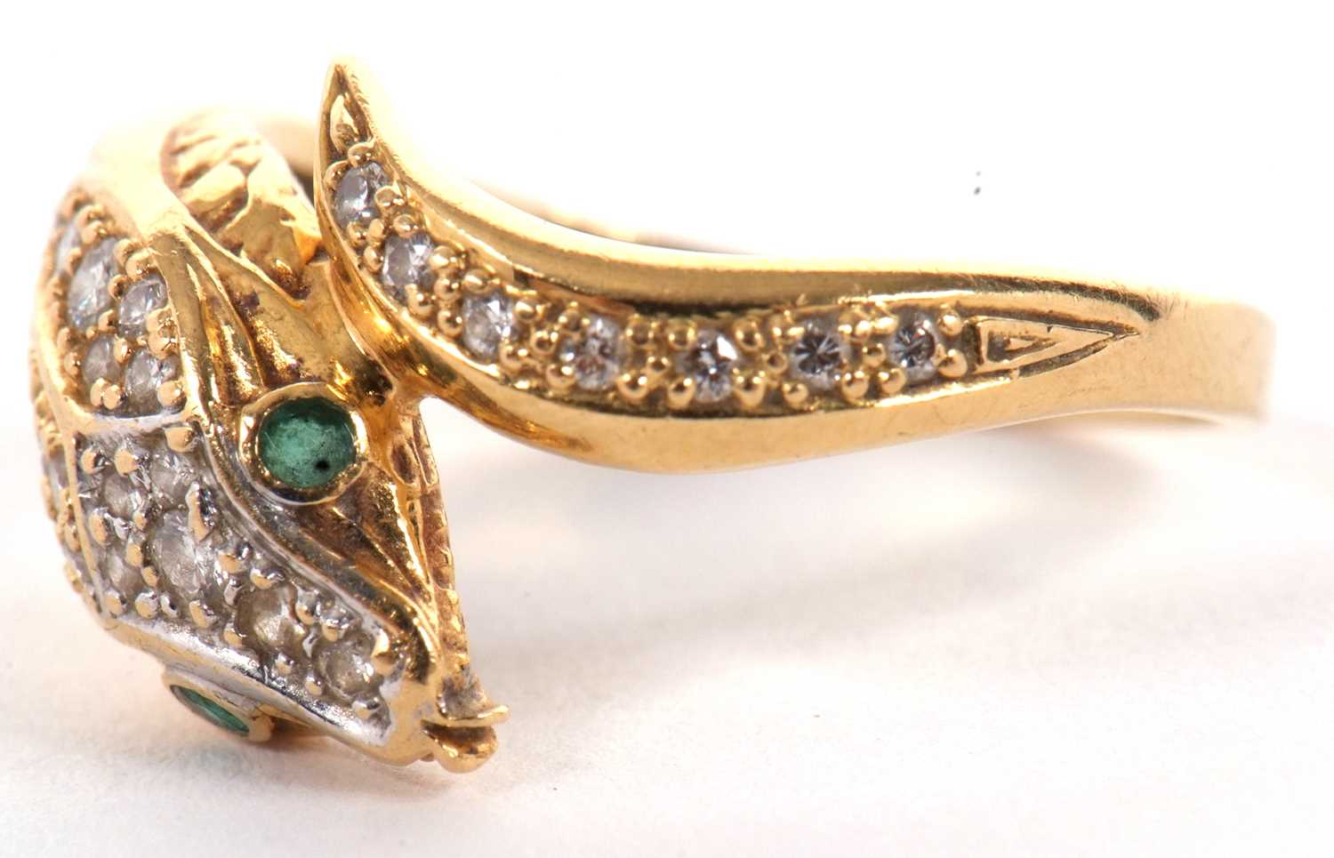 An 18ct snake head ring, the naturalistically modelled head pave set with diamonds and green - Image 2 of 8
