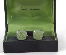 A pair of Paul Smith cufflinks, the squared panels of pistachio green with 'PS' to front, approx.