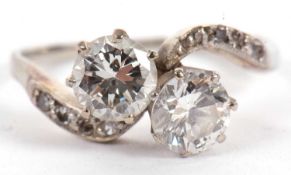 A 'toi et moi' two stone diamond ring, the round brilliant cut diamonds, total weight of diamonds
