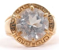 A 9ct topaz dress ring, the round pale blue/white topaz, approx. 13mm diameter, claw mounted with