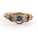 A 9ct sapphire and diamond ring, the graduated, alternating round sapphires and diamonds, with