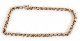 An unmarked yellow metal curblink bracelet, (tests as approx. 9ct gold), with later additional tag