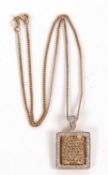 A 14ct diamond pendant and 9c chain, the rectangular pendant pave set with champagne diamonds with
