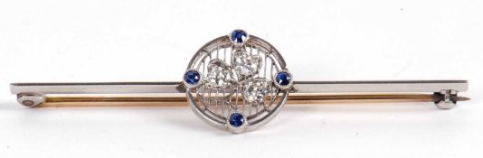 A sapphire and diamond bar brooch, the central round disc set with a three leave clover on a frame
