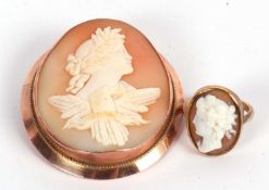 A 9ct cameo brooch and 18ct cameo ring, the oval shell brooch with Zeus and his eagle, collet