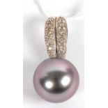 An 18kt black cultured pearl and diamond pendant, the round black cultured pearl, approx. 15.3mm