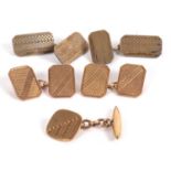 A pair of 9ct gold cufflinks, the rectangular panels with engraved decoration, stamped 375 (other