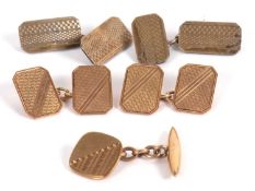 A pair of 9ct gold cufflinks, the rectangular panels with engraved decoration, stamped 375 (other