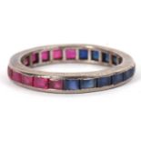 A ruby and sapphire eternity ring, the full hoop eternity ring set with sapphires to one half and