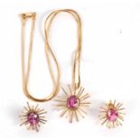 A pink sapphire 'starburst' necklace and matching earrings, the pendant set with an oval pink