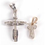 An 18ct white gold diamond cross pendant, total weight of diamonds estimated approx. 0.16cts, with