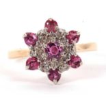 A 9ct ruby and diamond cluster ring, the central round ruby surrounded by small round diamonds and