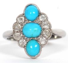 An 18ct turquoise and diamond ring, set with three oval turquoise cabochons and set with an arc of