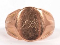 A 9ct gold signet ring, the oval signet ring (initals indistinct) with tapered shoulders and plain