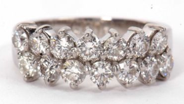 A diamond ring, the two rows of round brilliant cut diamonds, total estimated approx. 1.40cts, all