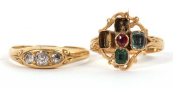 Two 18ct gemset rings, the first set with three graduated old mine cut diamonds with a navette