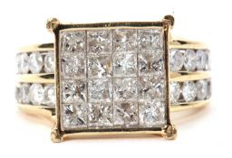 A 9ct diamond ring, the central square panel mystery set with princess cut diamonds, 12mm wide,