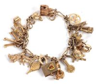 A 9ct charm bracelet, with clasp and one link stamped 375, with variously marked charms, 34.9g