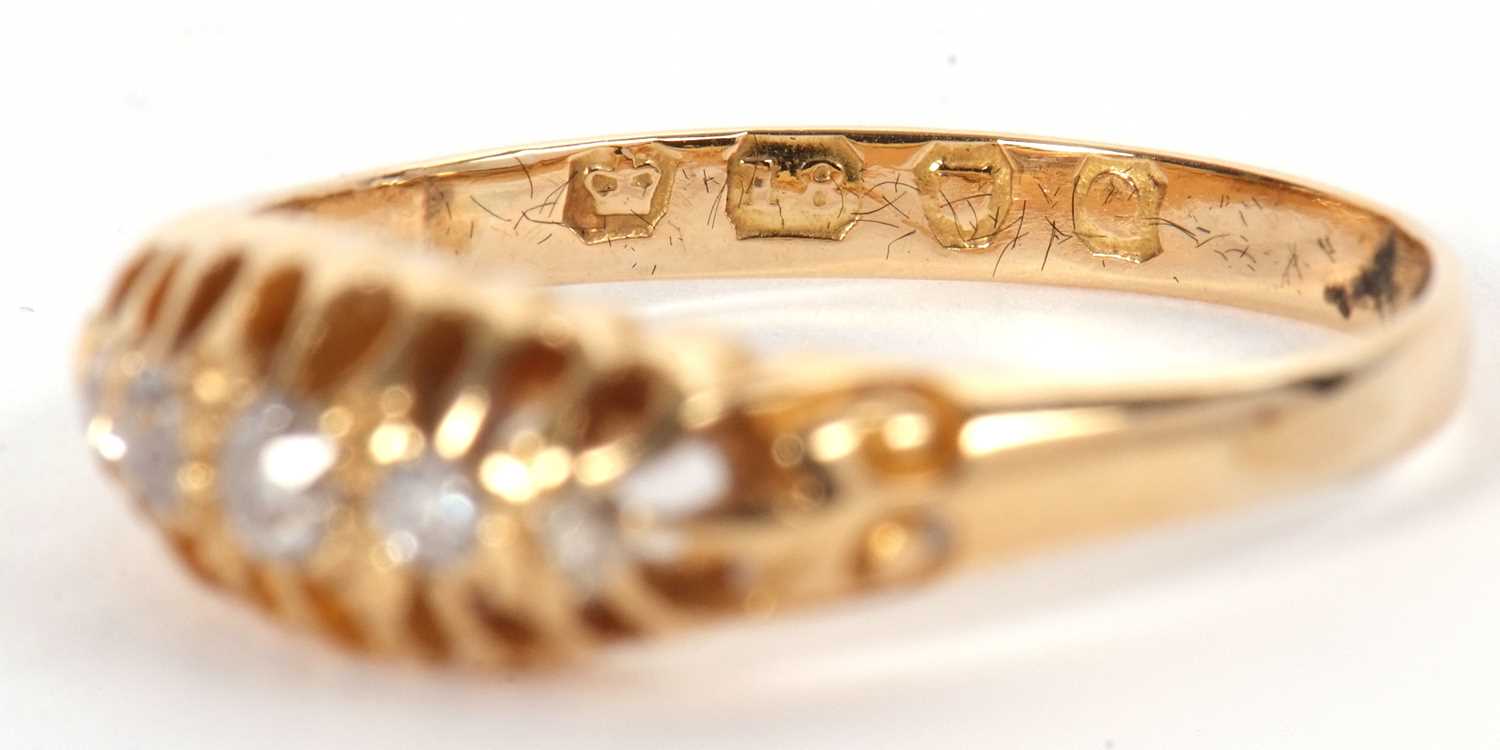 An 18ct diamond ring, the five graduated old cut diamonds, claw mounted with tapered shoulders and - Image 7 of 7