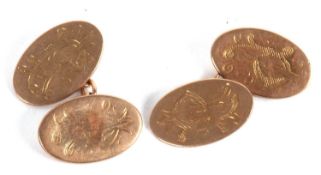 A pair of 9ct cufflinks, the oval discs with chain links, indistinctly stamped 375 to reverse (marks