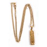 An Egyptian pendant and 18ct chain, the pendant with heiroglyphics, Egyptian marks (tests as approx.