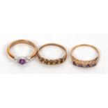 Three 9ct rings: to include a 9ct three stone amethyst and CZ ring, size L, 2.4g, a 9ct six stone