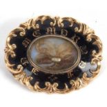 A 19th century memorial brooch, the black enamel brooch with 'In Memory' to front, with central