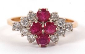 An 18ct ruby and diamond ring, the four central round rubies set to either side with five small